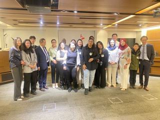 Participants gathering for a group photograph.